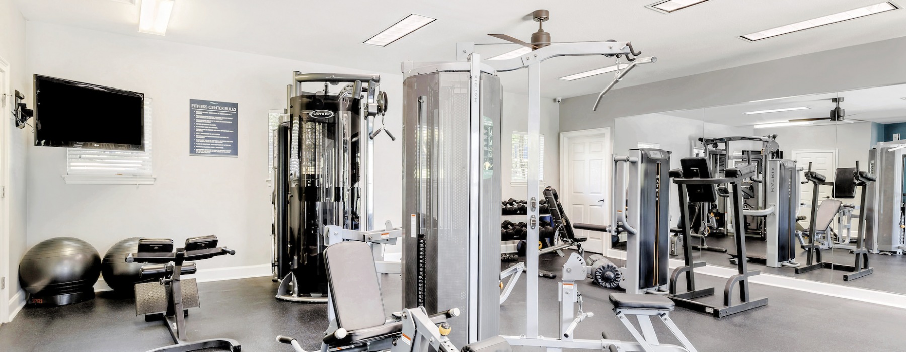Large fitness center with workout equipment